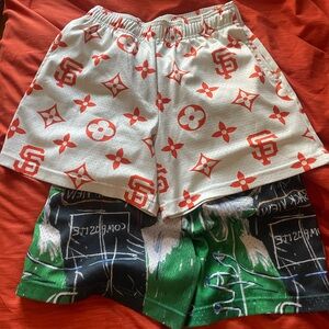 (2) Bravest Studios gym shorts  - size small - ultra rare